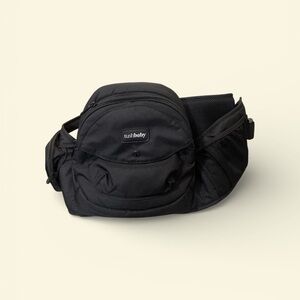 Black TushBaby hip carrier for baby